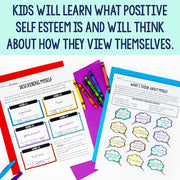 Educational materials on self-esteem with colorful crayons and paper.