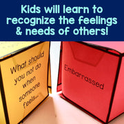 Colorful cubes with text on a blue background, promoting emotional awareness.