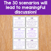 Educational cards on a wooden surface with text about scenarios leading to discussion.