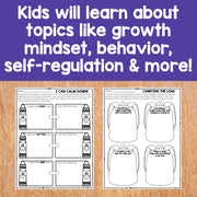 Educational worksheets on a wooden surface with text about learning topics.
