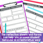 Behavior reflection sheets on a clipboard with a pen, emphasizing restorative behavior processing.
