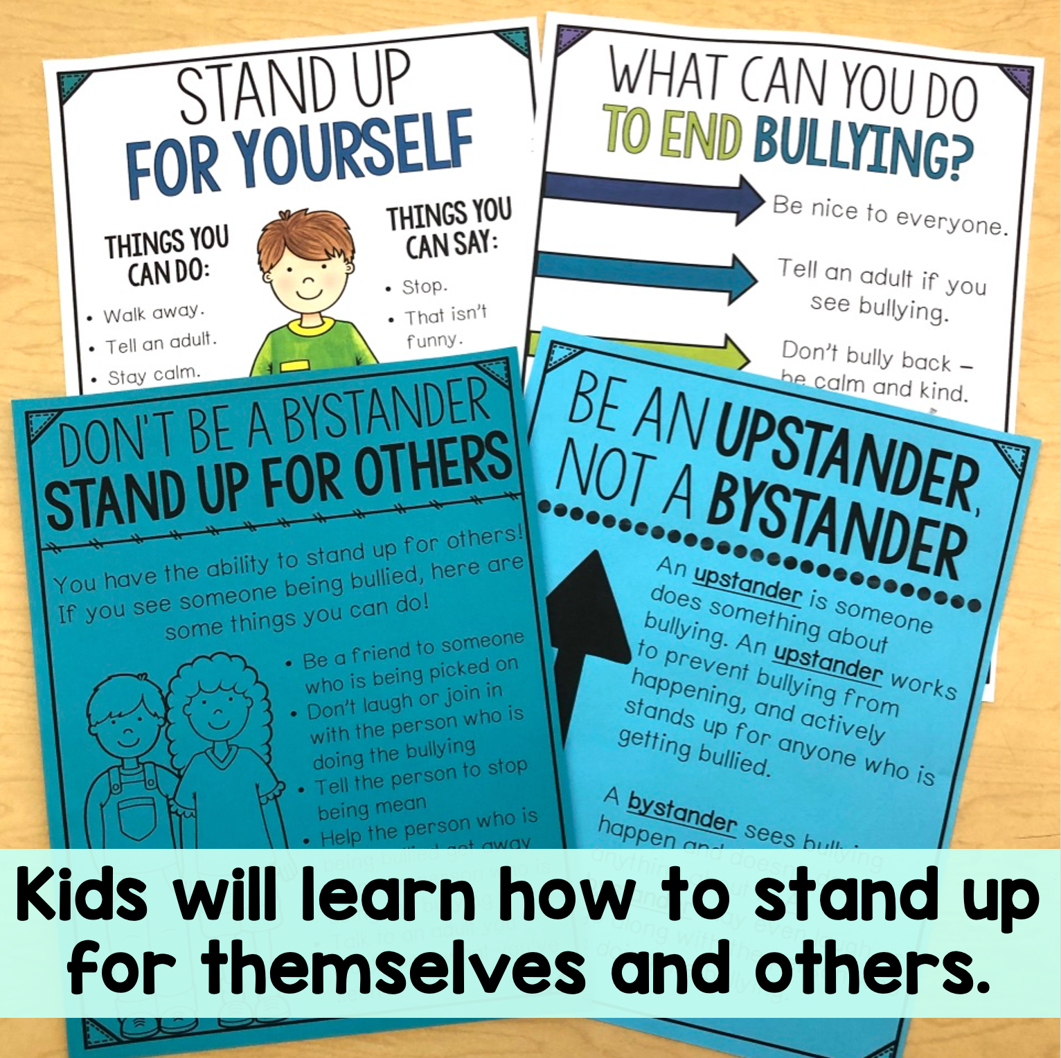 Educational posters on a wooden surface teaching children about standing up for themselves and others.