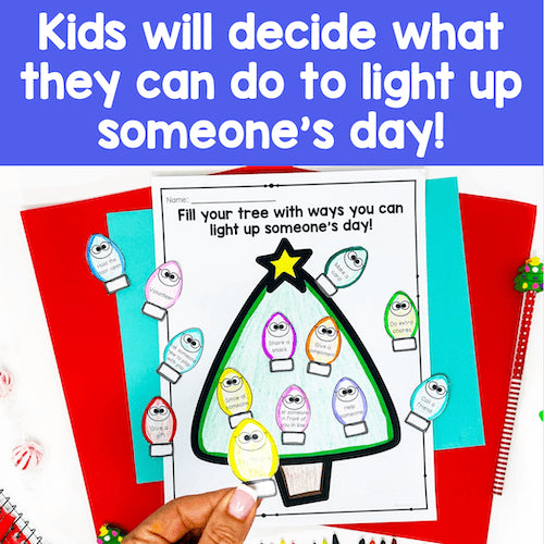 Colorful Christmas-themed activity sheet with cut-out lights, held by a hand against a blue background.