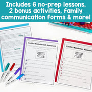 Educational materials with worksheets and markers on a white background