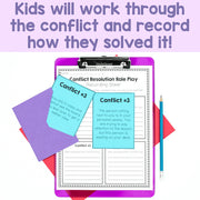 Clipboard with conflict resolution role play sheet and colorful notes on a white background