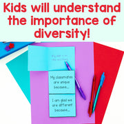 Colorful paper with writing prompts and pens on a white background, promoting diversity education.
