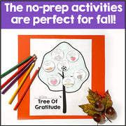 Tree of Gratitude worksheet with colored pencils and fall leaves on a white background