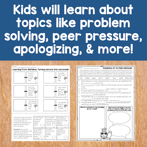 Educational worksheets on a wooden surface with text about learning topics.