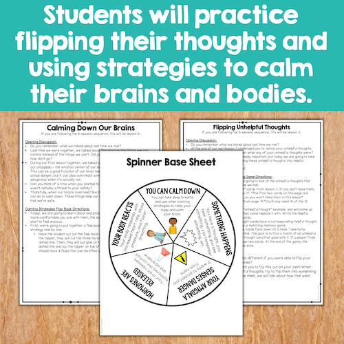 Educational materials on a wooden surface with text about practicing thoughts and strategies to calm brains and bodies.