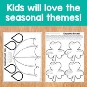 Educational materials with heart shapes and text on a wooden surface