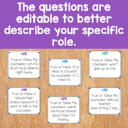 Educational cards with true or false questions on a wooden surface with a purple background.