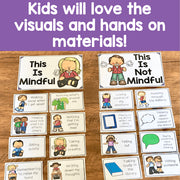 Educational cards on a wooden surface with text about mindfulness.