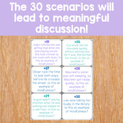 Educational cards on a wooden surface with text about mindfulness scenarios.