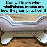 White wooden tool with text on a wooden surface and blue background