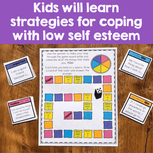 Educational game board and cards for coping with low self-esteem on a wooden surface.