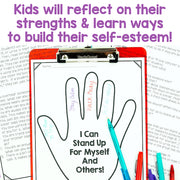 Handout with a hand drawing and text about self-esteem on a clipboard with colorful pens.
