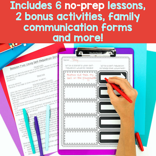 Hand holding a red pen over a clipboard with educational materials on a colorful background