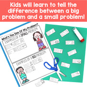 Educational materials for teaching children about big and small problems with worksheets, scissors, and markers.