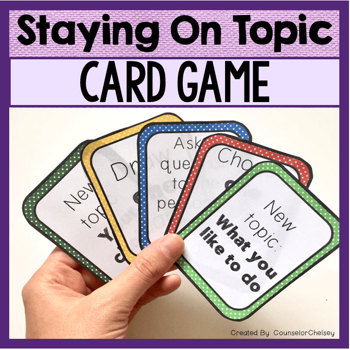 Hand holding educational card game with text on a purple background