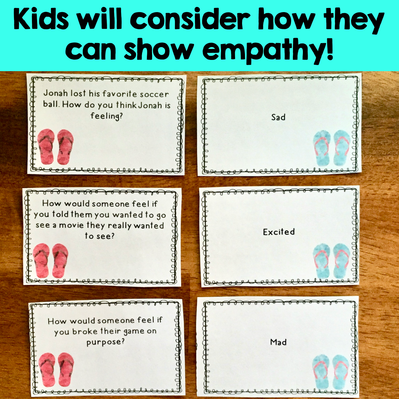 Educational cards on a wooden surface with scenarios and emotion labels for empathy practice.