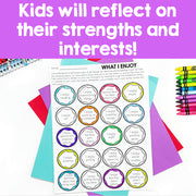 Sheet of 'What I Enjoy' activity with colorful circles and crayons on a purple background